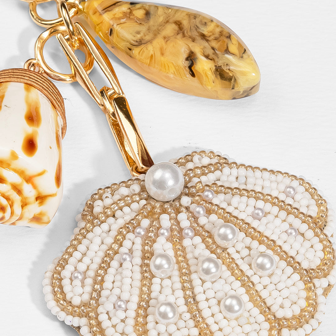 Pendente de bolsa em formato de concha bordada - Branco