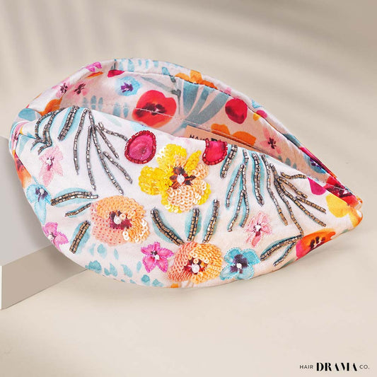 Tiara com nó de flor