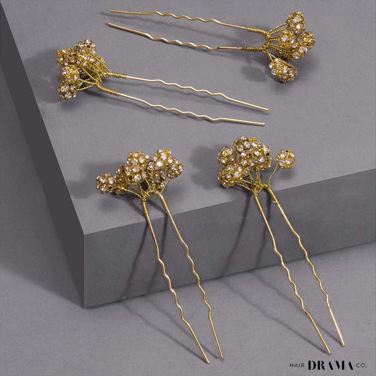 Conjunto de 4 pregadeiras em forma de U com pérolas decoradas - Dourado