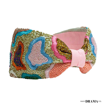 Fita de cabelo com nó de primavera