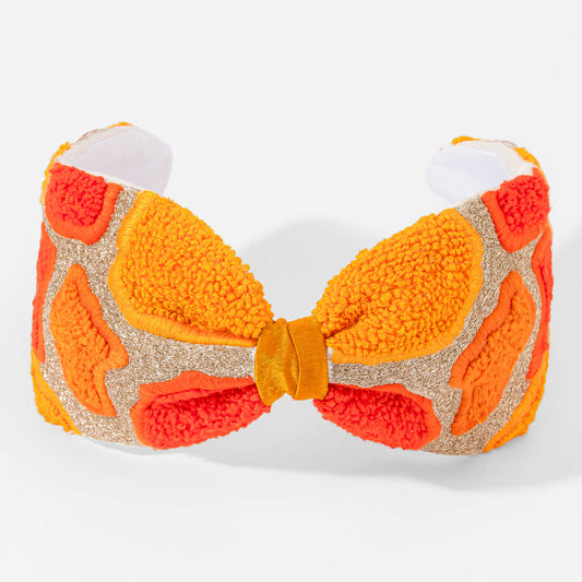 Fita de cabelo âmbar com nó