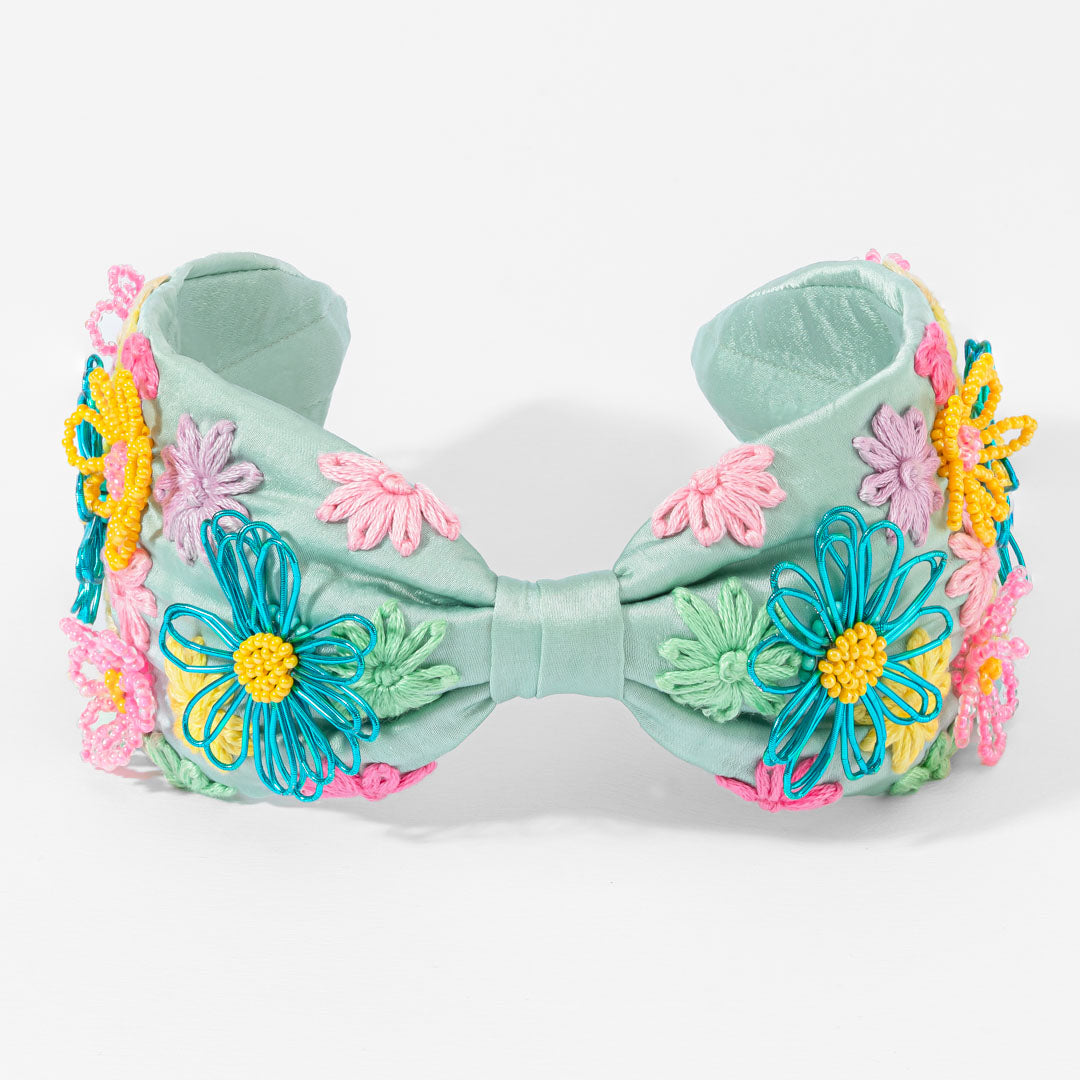 Fita de cabeça com nó de prado