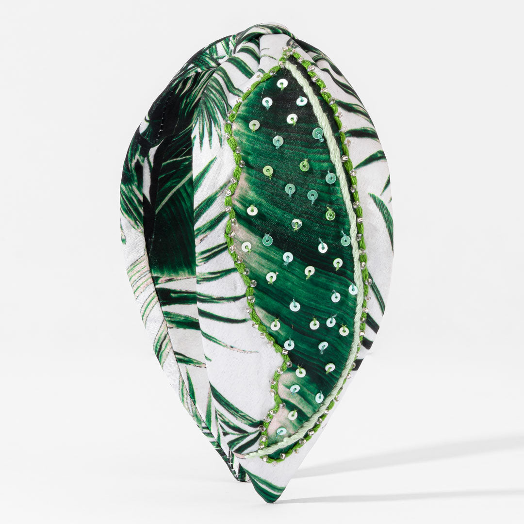 Fita de cabeça com nó de folha de palmeira