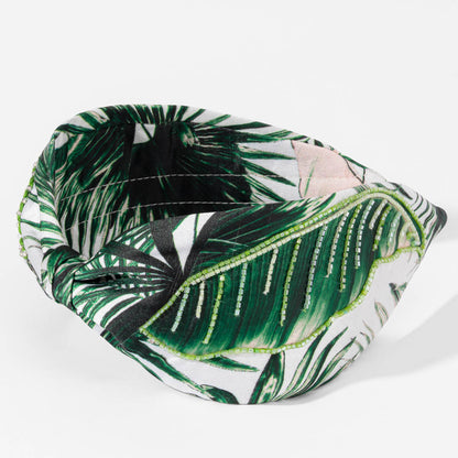 Fita de cabeça com nó de folha de palmeira