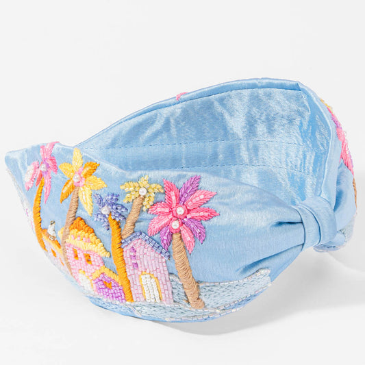 Fita de cabeça com nó e o horizonte de Omã