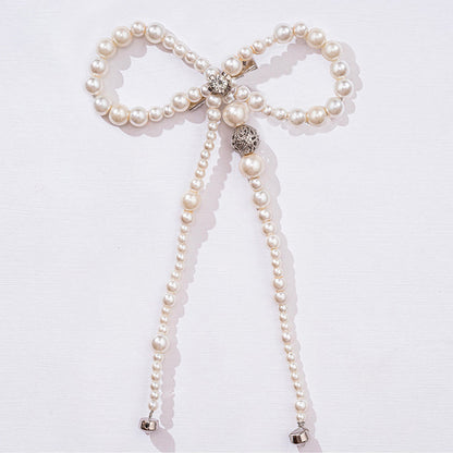 Presilha de cabelo com laço de pérolas e pedra prateada - Branco-creme